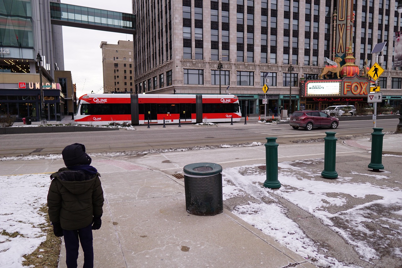 little boy standing across from fox theatre